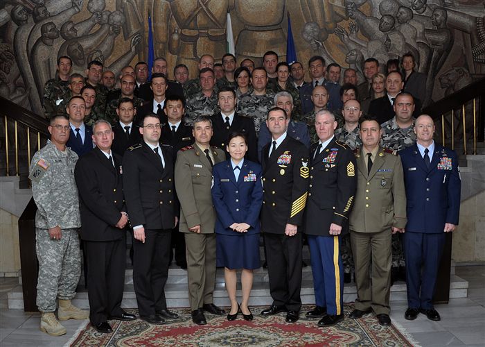 SOFIA, Bulgaria -- Senior enlisted leaders from Bulgarian and U.S. military forces pose for a group photograph before the final day of the first joint-nation NCO symposium at the Bulgarian Land Forces headquarters here April 11. More than 40 senior enlisted leaders met to discuss doctrine, strengths and leadership philosophies, which are designed to empower and inspire NCOs in both nations' corps.