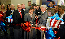 Photo caption: Congressional Representatives C.W. “Bill” Young, Gus Bilirakis and Kathy Castor help cut the ribbon at the USO Tampa Bay Center opening. (Photo credit: Kelly Sheehan / USO) 