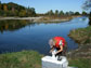 Photo of Carly Strasser collecting copepods in an estuary in the Pacific Northwest.