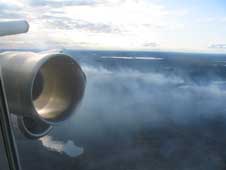 An instrument from the National Center for Atmospheric Research collects data from a smoke plume generated by a forest fire over Canada on July 1, 2008.