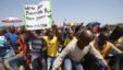 Striking platinum miners march near the Anglo American Platinum (AMPLATS) mine near Rustenburg in South Africa's North West Province, October 5, 2012. 