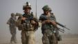 A US Marine and an Afghan soldier are seen on joint patrol in Helmand province, southern Afghanistan (file photo).