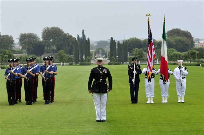 NETTUNO, Italy (May 28, 2012) - Italian Carabinieri and service members from U.S. Naval Forces Europe-Africa, present the colors during a Memorial Day ceremony at the Sicily-Rome American Cemetery in Nettuno. During the ceremony, veterans, service members, students and families gathered to honor and pay tribute to the fallen warriors who gave their lives during the liberation of Italy in 1943.