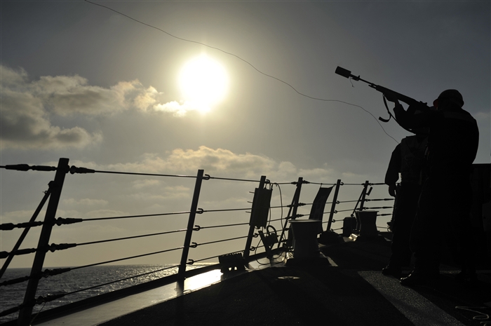 MEDITERRANEAN SEA - Gunner's Mate 3rd Class Chris Baker fires a shot line from the forecastle of the
guided-missile destroyer USS Jason Dunham (DDG 109) to the Military Sealift Command fleet-replenishment oiler USNS John Lenthall (T-AO 189) during an
underway replenishment. Jason Dunham is on a scheduled deployment in support of maritime security operations and theater security cooperation efforts in the U.S. 6th Fleet area of responsibility.