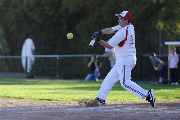 LA ROCHELLE, France  - Seaman Nick Tonello swings at a pitch during a softball game between Sailors from the guided-missile destroyer USS Farragut (DDG 99) and Les Boucaniers, the La
Rochelle baseball club. Farragut is on a scheduled deployment in support of maritime security operations and theater security cooperation efforts in the U.S. 6th Fleet area of responsibility.