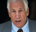  In this June 21, 2012 file photo, former Penn State University assistant football coach Jerry Sandusky leaves the Centre County Courthouse in Bellefonte, Pa. 