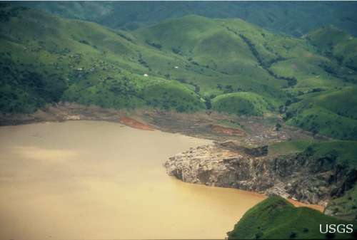 A view of the shore of Lake Nyos after a gas explosion caused a wave that denuded much of the shore of buildings and vegetation