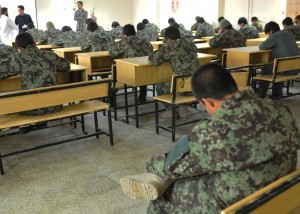 Fifty-three Afghan National Security Force members take an end of lesson knowledge test at a Kandahar Regional Military Hospital training classroom, Apr. 23, 2012. The ANSF members are taking a 64-week combat physician assistant course which started October 2011. The course was designed to prepare members to become medical advisors in a hospital, clinic or field setting. This is the first time the combat physician assistant course is being taught at KRMH.