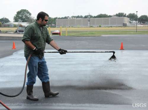 Coal-Tar Sealcoat: a Major Source of PAHs to Air and to Children Living Nearby