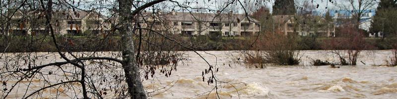 December 18th, 1964. High waters from the river gush through the streets.