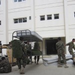 Afghan National Army soldiers move into the new barracks in preparation for the commencement of the One Uniform Course at the Kabul Military Training Center located on the outskirts of Kabul, Afghanistan, June 23, 2012.