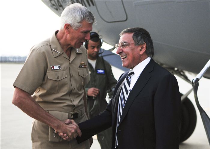 NAPLES, Italy (October 6, 2011) - Adm. Samuel Locklear III, commander, U.S. Naval Forces Europe-Africa, and commander, Allied Joint Forces Command Naples, greets the Secretary of Defense Leon E. Panetta as he arrives in Naples. Panetta is visiting Naples to receive a NATO briefing and visit U.S. troops.