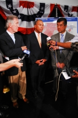 Locke and officials meet media. Photo: Holland Hinman/Governor's Office