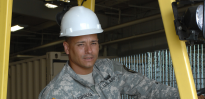 Sergeant Espinosa driving a forklift