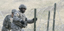 Combat engineers secure constantina wire