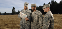 Soldiers reading a map