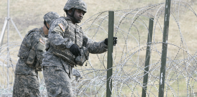 Combat engineers secure constantina wire