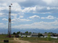 Photo of a workover rig completing a well near a surburban development in Weld County, Colo.
