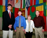 UT-Battelle Scholarship winner Jeremy Buckles is flanked by ORNL Director Thom Mason (left) and his parents, Betty and Keith Buckles of Lenoir City. Jeremy will attend the University of Tennessee with the help of the four-year scholarship.