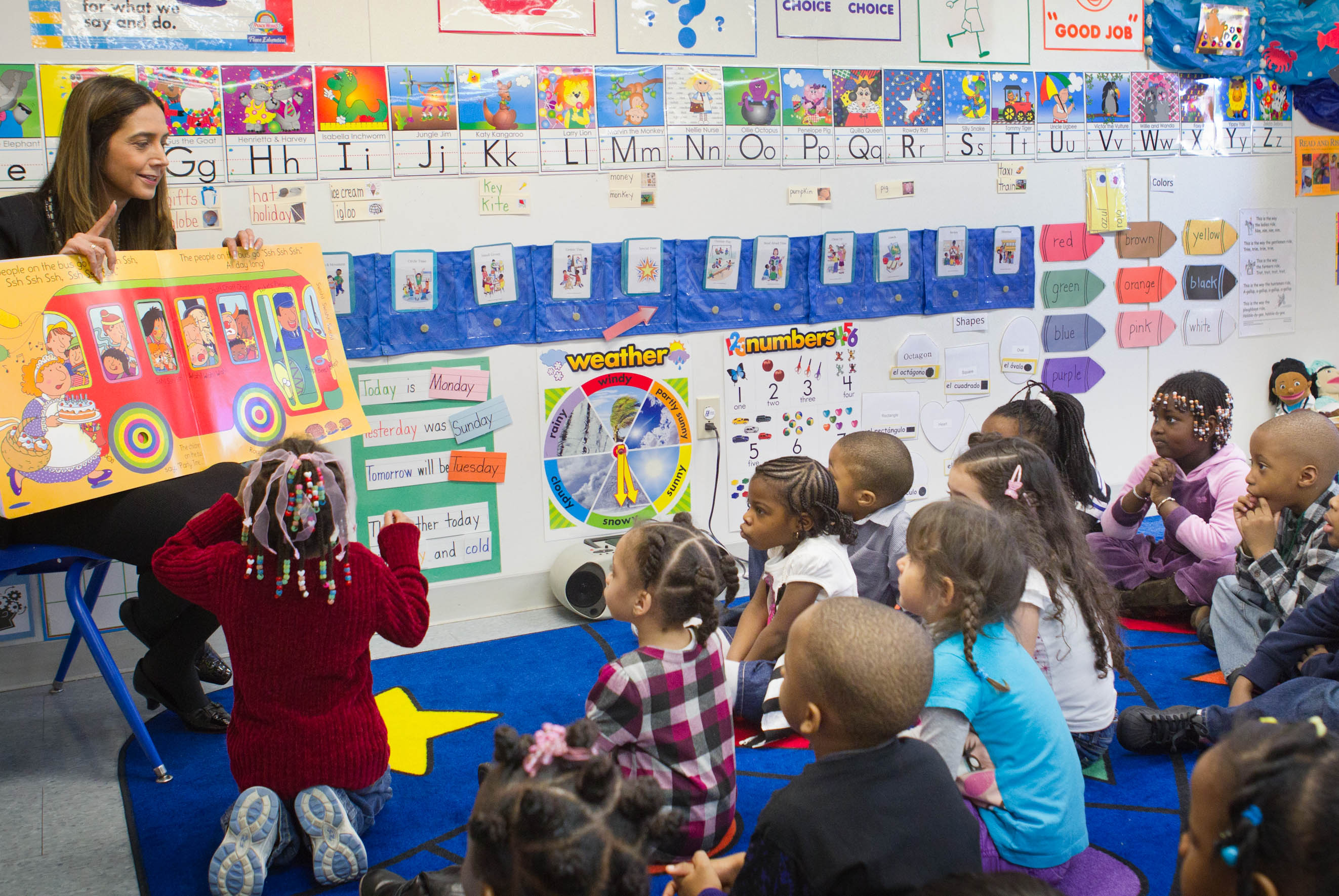 Dr. Melendez reads to Head Start students.