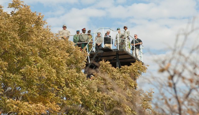 Secretary of the Army John McHugh, U.S. Ambassador to Botswana Michelle D. Gavin and other U.S. and Botswana Defence Force officials watch a capabilities demonstration from a control tower during Exercise Eastern Piper 2012, near Gaborone, Botswana, June 20, 2012.