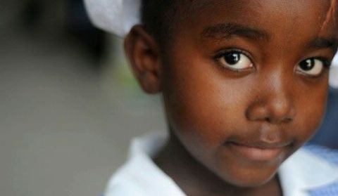 Date: 01/09/2012 Description: Seven-year-old Amelia bears a scar from where a concrete block struck her during the earthquake. She is a student at Ecole Marie Dominique Mazzarello in Port-au-Prince, which has classrooms built as part of the PHARE program of USAID. © Photo by Kendra Helmer/USAID