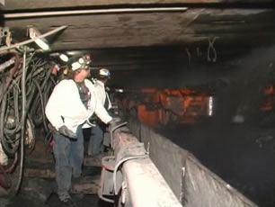 Thumbnail of video showing coal miners underground