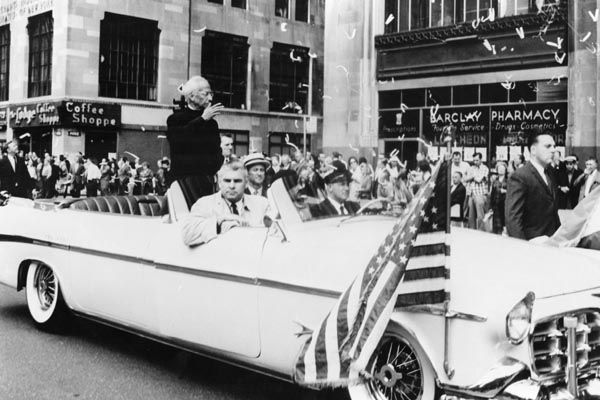 June 10, 1963:  Special Agent Leo Crampsey (front passenger seat) protects the President of India, Sir Sarvepalli Radhakrishnan, during a New York City ticker tape parade. (Source: DS Records)