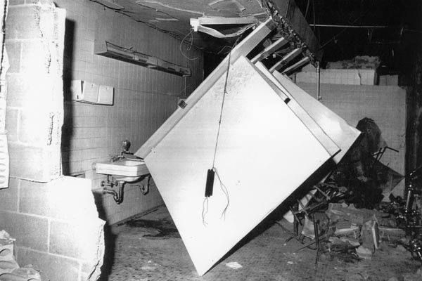 January 29, 1975:  Bomb damage to a third floor bathroom in the Main State (now Harry S Truman) building of the U.S. Department of State. The Weather Underground, a splinter group of the radical leftist Weathermen group, plants the bomb to protest President Gerald R. Ford's Vietnam policy.  Among the damaged offices is that of the chief of the SY Division of Investigations. (Source: DS Records)