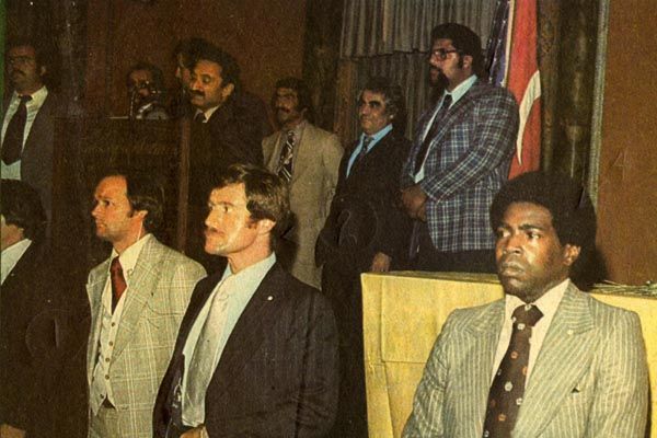 July 26, 1976:  Security Office special agents scan the audience as Turkey's former Prime Minister Bulent Ecevit speaks in the Empire Ballroom of the Waldorf Astoria Hotel in New York City.  As Ecevit leaves the ballroom, SY agents successfully thwart an attempted assassination by a Greek Cypriot extremist.  (Source: Private Collection) 