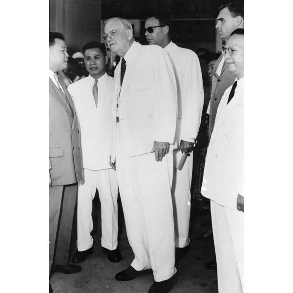 March 1956:  Special Agent Leo Crampsey (right) provides security for U.S. Secretary of State John Foster Dulles as he meets with senior South Vietnamese officials in Saigon. (DS Records)