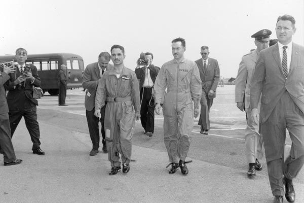 1959:  His Majesty King Hussein of Jordan (center left), with protective detail headed by Special Agent James M. McDermott (right, foreground). (Source: Private Collection)