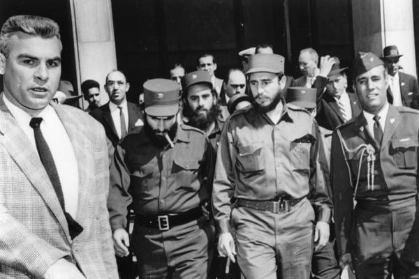 April 1959:  Special Agent Leo Crampsey (left) escorts Cuba's new Premier Fidel Castro (center) during a visit to Washington, DC, shortly after the January revolution in Cuba. (Source: U.S. Department of State)