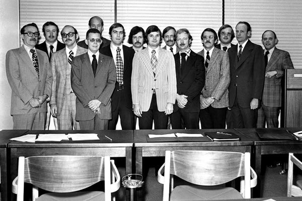 November 1974:  Deputy Assistant Secretary of State for Security Victor Dikeos (left) stands with graduates of the Office of Security's (SY's) first special agents training course.  Dikeos was instrumental in reorganizing and transforming SY to better address the Department's security, protection, and technology requirements in an era of terrorist threats. (DS Records)