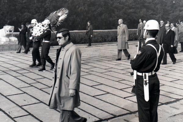 February 1977:  U.S. Special Envoy Clark Clifford (following wreath at rear center, in light gray overcoat) and his SY protective security detail in Ankara, Turkey, attend a wreath-laying ceremony at the tomb of Mustafa Kemal Ataturk, founder and first president of modern Turkey.  (Source:  Private Collection)