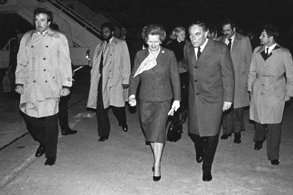 February 25, 1981:  SY special agents (2nd from left and 2nd from right) escort U.S. Secretary of State Alexander Haig and Britain's Prime Minister Margaret Thatcher upon her arrival in Washington, D.C.. (Source: DS Records)