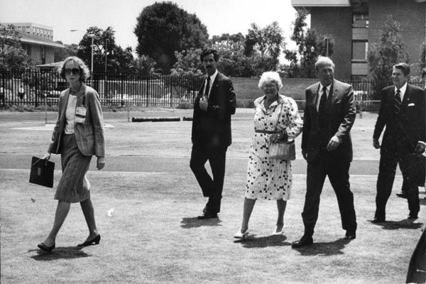 1984:  An SY special agent and advance agent accompany U.S. Secretary of State and Mrs. George P. Shultz and President Ronald Reagan at the Los Angeles Olympic Games. (Source: DS Records)