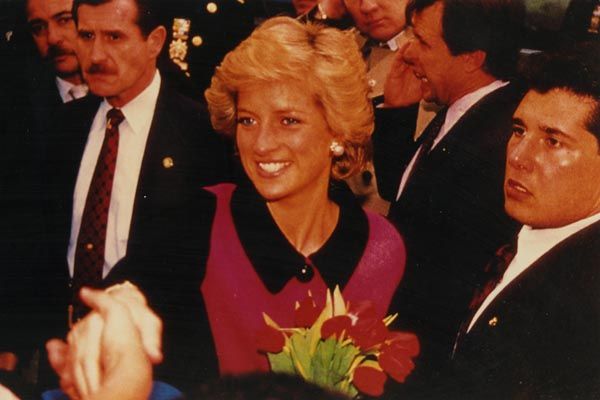February 1989:  DS special agents protect Britain's Princess Diana during her visit to a Harlem AIDS Center in New York City. (Source: Private Collection)