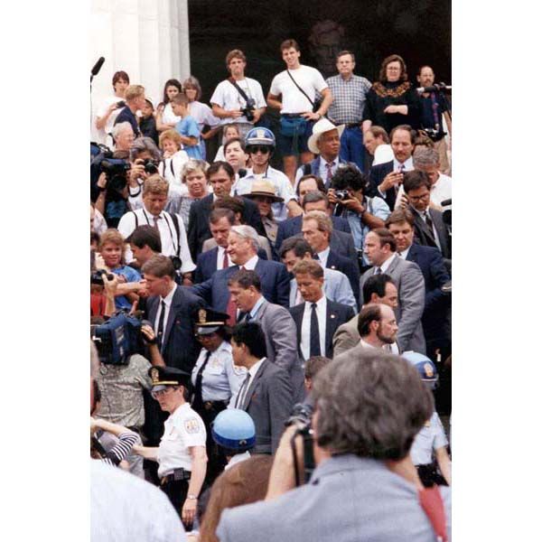 June 20, 1991:  Russian President Boris Yeltsin (white hair, center) is covered by a DS protective detail during a visit to the Lincoln Memorial in Washington, D.C. (Source: DS Records)