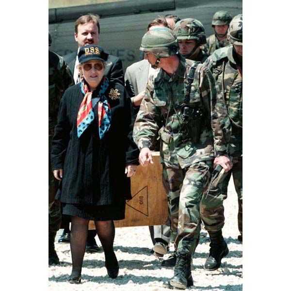 June 1, 1997:  Proudly wearing a DSS-emblazoned ball cap, U.S. Secretary of State Madeleine Albright , with DS agent protection, arrives at the U.S. Army's McGovern Base north of Sarajevo to visit American troops serving in Bosnia. (Source: Associated Press)