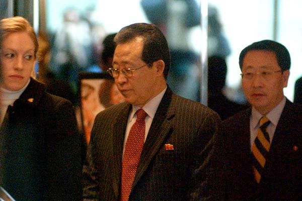 March 4, 2007:  A DS special agent, left, provides protection for North Korean nuclear negotiators during disarmament talks with U.S. Ambassador Christopher Hill in New York City.  (Source: Associated Press)