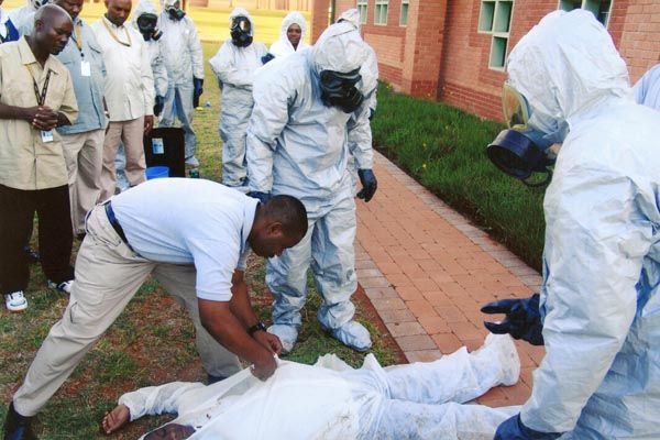 May 5, 2007:  A DS weapons of mass destruction specialist (front left, bending over) trains foreign law enforcement officials at the International Law Enforcement Academy in Gaborone, Botswana. (Source: ILEA Gaborone)