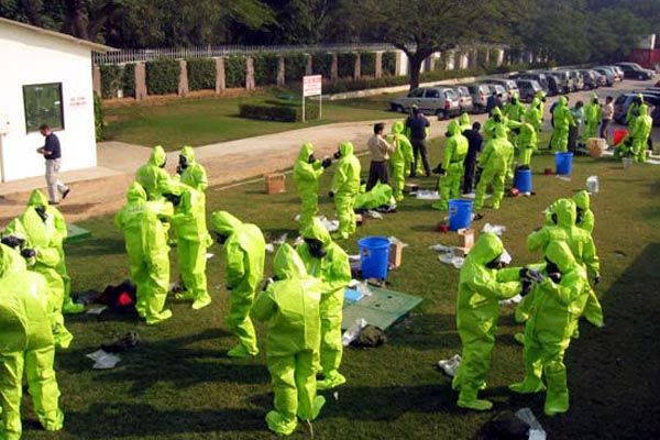 Circa 2005:  A WMD decontamination training drill at a U.S. embassy overseas.  (Source: U.S. Department of State)