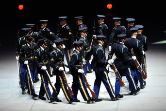 Sgt. Maj. of the Army Raymond F. Chandler III is encouraging all active-duty, Reserve and National Guard Soldiers to take the Army Service Uniform survey to help inform the Army's decisions regarding  future uniforms and equipment. Pictured here, the U.S. Army Drill Team performs precision drills, wearing the Army Service Uniform, during the Army's Spirit of America show in the Greensboro Coliseum, Greensboro, N.C., Sept. 14, 2012.