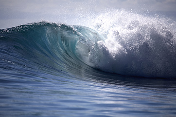 Photo of an ocean wave crashing