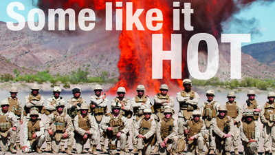 Marine Wing Support Squadron 371 Marines casually pose for a platoon photo at the combat engineer demolition range at the U.S. Army’s Yuma Proving Grounds