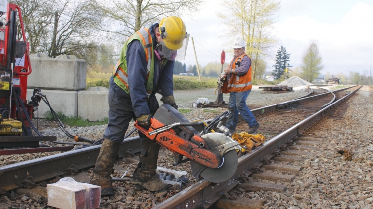 Workers on Tracks