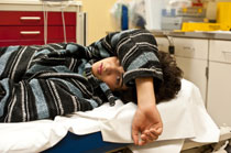 A sick teen in the nurse's office