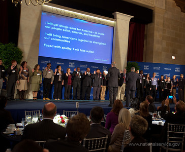 AmeriCorps Director Bill Basl and retired Army Gen. George Casey swear in new members of the Veteran Leader Corps during a ceremony in Washington, DC, on Oct.9, 2012.