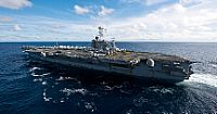 The Nimitz-class aircraft carrier USS John C. Stennis (CVN 74) is underway in the Andaman Sea during exercises with the Nimitz-class aircraft carrier USS George Washington (CVN 73).